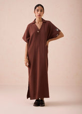 A Model Wearing Brown Organic Cotton The Mountainside Organic Cotton Collar Maxi Dress, curated by Only Ethikal